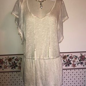 Oatmeal/cream blouse with lace.